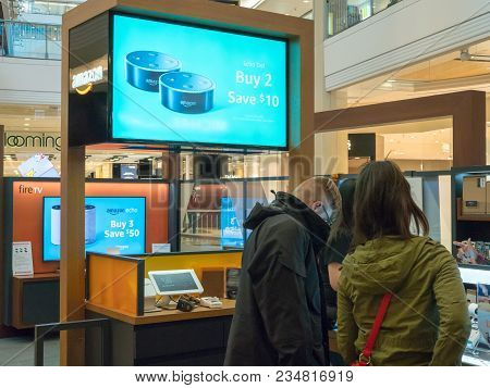 San Francisco, Ca - March 25, 2018: Two Shoppers Browse An Amazon Pop Up Store In Downtown San Franc