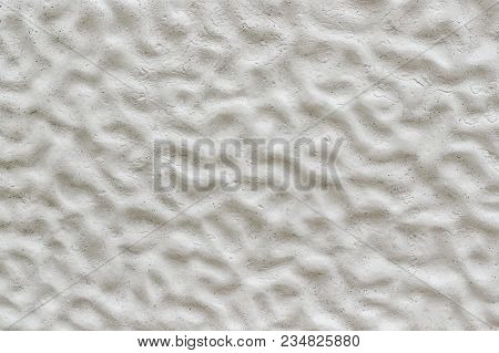 White Decorative Colored Surface As Seamless Texture Or A Background With Wavy Irregular Pattern .