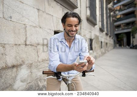 Young Happy Attractive Hispanic Man In Casual Trendy Clothes Smiling Cheerful Using Mobile Phone On 