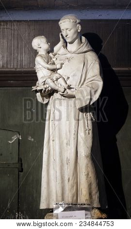 PARIS, FRANCE - JANUARY 04: Saint Anthony of Padua holding child Jesus, statue in the Saint Sulpice Church, Paris, France on January 04, 2018.