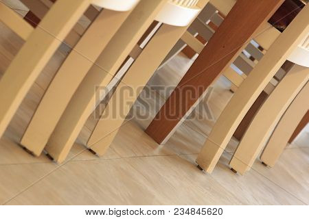 The Legs Of Many Modern Wooden Chairs.