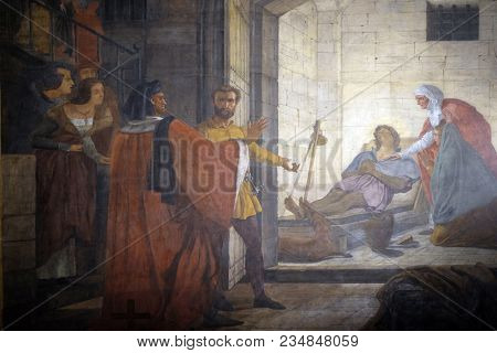 PARIS, FRANCE - JANUARY 04: Saint Roch expired in a Montpellier prison, by Abel de Pujol, fresco in the Saint Sulpice Church, Paris, France on January 04, 2018.