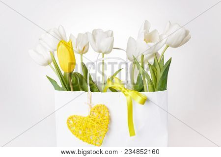Festive White, Yellow Tulips Composition, Handmade Heart, Ribbon On White Background. Bouquet Of Spr