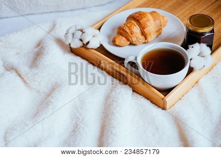 Big White Morning Cup Of Coffee, Crossant And Jam On The Wooden Tray Decorated With Cotton Flowers I