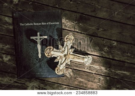 3d Illustration Of The Exorcism Book On Wooden Floor