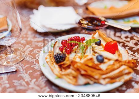 Russian National Cuisine - Pancakes With Fresh Berries. Traditional Meal For Maslenitsa Holiday (shr