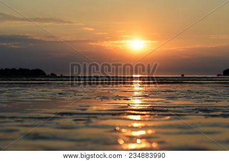 The Outfall On Sand Beach. Beautiful Sunrise Sky Over Adriatic Sea
