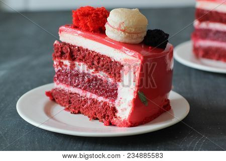 Red Velvet. Tasty Red Homemade Cake Decorated By Macarons. Modern Photo