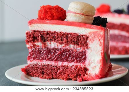 Red Velvet. Tasty Red Homemade Cake Decorated By Macarons. Modern Photo