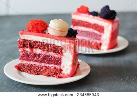 Red Velvet. Tasty Red Homemade Cake Decorated By Macarons. Modern Photo