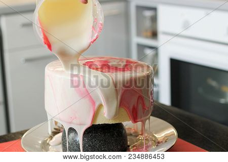 Making Of Tasty Pink Homemade Cake. Marbelous Effect On Cake