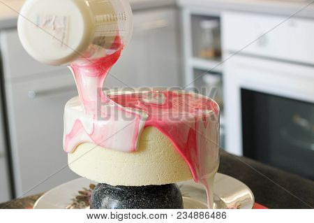 Making Of Tasty Pink Homemade Cake. Marbelous Effect On Cake