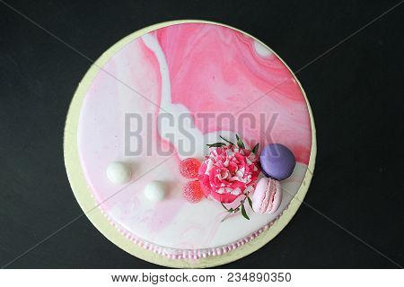 Tasty Pink Homemade Cake Decorated By Rose And Macarons. Marbelous Effect On Cake