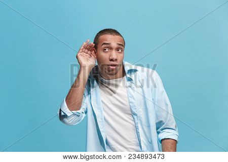 Secret, Gossip Concept. Young Man Whispering A Secret Behind His Hand. Afro Businessman Isolated On 