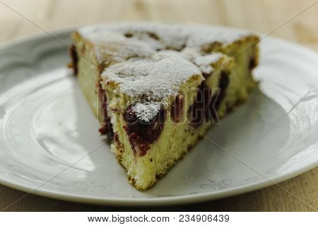 Plate of cherry cake food.Healthy food. Sweet food. Plate of cherry cake. Desert food. Homemade food. Lifestyle. Healthy lifestyle. Food. Cherry cake. Plate.
