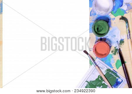 Color Gouache Jars On White Background. Top View, Copy Space.