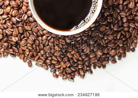 Coffee Cup On Spilled Coffee Beans, Top View