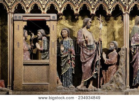 PARIS, FRANCE - JANUARY 04: Intricately carved and painted frieze inside Notre Dame Cathedral depicting Appearance to Peter and John, UNESCO World Heritage Site in Paris, France on January 04, 2018.