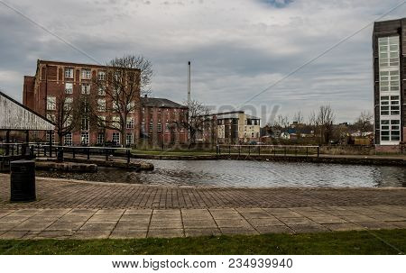 The Paved Towpath And The Dry Dock In Wigan On The Leeds Liverpool Canal