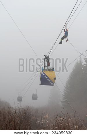 Alpinist Is Rescue People Exercise On Gondola Car