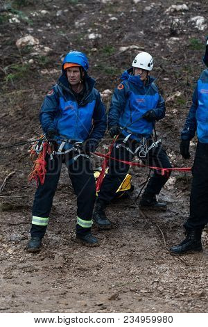Rescue Man Helping Out On Land With Rope