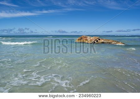 Boat Wreck Sunk And Battered By Ocean Waves At Carpenter Rocks, South Australia. Accessed Via The  C