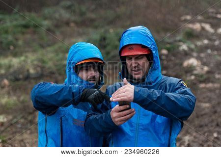 Rescue Man Helping Out On Land With Rope
