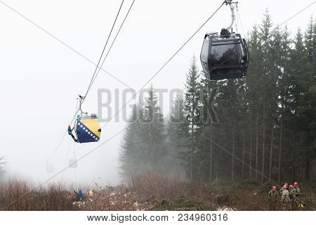 Alpinist Is Rescue People Exercise On Gondola Car