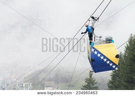 Alpinist Is Rescue People Exercise On Gondola Car