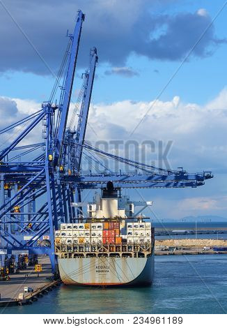 Valencia, Spain - March 16, 2018: Containers Being Loaded Onto The Aegiali In Valencia Spain