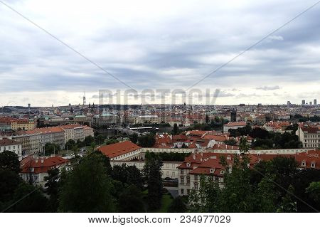 Beautiful View Of The Old Part Of The City, Houses With Red Tiles. Background