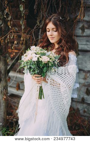 Stylish Beautiful Bride With Wedding Bouquet In Nature