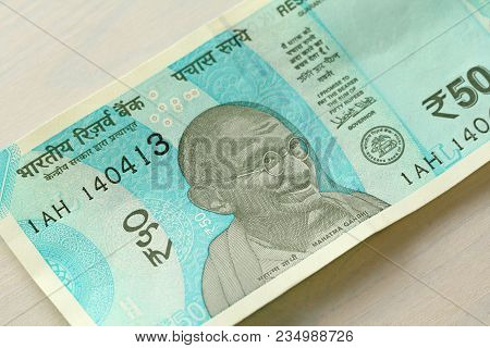 A New Banknote Of India With A Denomination Of 50 Rupees. Indian Currency. Portrait Of Mahatma Gandh