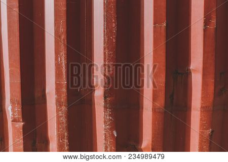 Texture Backdrop Background Bright Red Orange Metal Fence With Damages, Scratches, Bumps And Depress