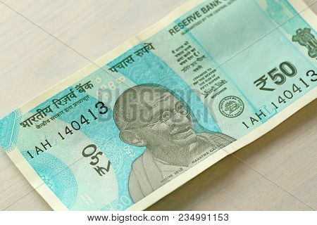 A New Banknote Of India With A Denomination Of 50 Rupees. Indian Currency. Portrait Of Mahatma Gandh