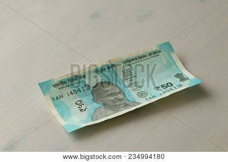 A New Banknote Of India With A Denomination Of 50 Rupees. Indian Currency. Portrait Of Mahatma Gandh