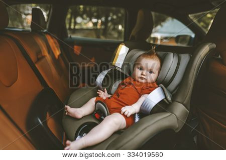 Infant Baby Sitting In Safety Car Seat Child Security Transportation Family Lifestyle Cute Ginger Ha