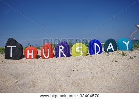 Thursday, fourth day of the week on colourful stones