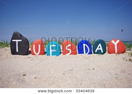 Monday, first day of the week on colourful stones