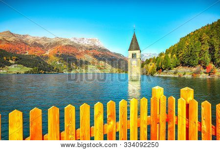 Fantasic Autumn View Of Submerged Bell Tower In Lake Resia.
Location: Graun Im Vinschgau Village, La