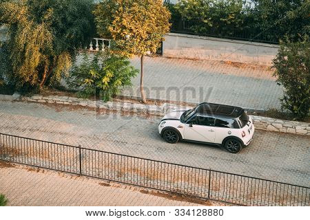 Kusadas , Turkey - September 12, 2019: Top View Of White Color 2004 Mini One Hatch Mini Cooper Car P