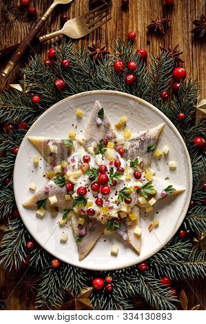 Christmas Herrings Fillets With Cream Sauce With Apple, Pickled Cucumbers, Red Onion And Spices, Gar