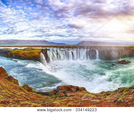 Fantastic Sunset Scene Of Powerful Godafoss Waterfall. Dramatic Sky Over Godafoss. Location: Bardard