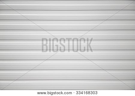 Garage Slide Roller Shutter Door Stripped Texture, Metal Background.