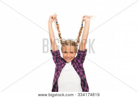 Long And Plaited. Happy Small Girl Hold Long Blond Braids. Adorable Little Child Smile With Long Pla