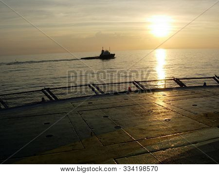Offshore Malaysia Sunrise, Supply Tug On Standby.