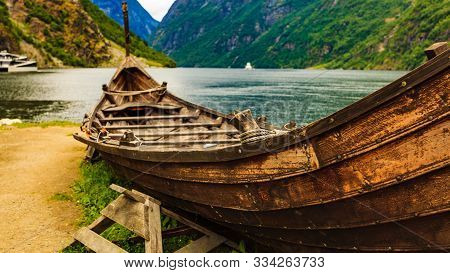 Old Viking Boat On Fjord Shore, Norway