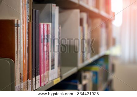 Close Up Of Book Shelves In Library.