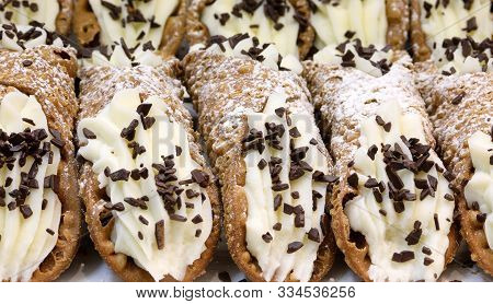 Background Of Many Pastry Items Called Sicilian Cannoli Typical Cake Of Palermo And Sicily In Italy