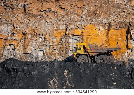 Big Yellow Mining Truck Laden Anthracite Moves Open Pit Coal Mine